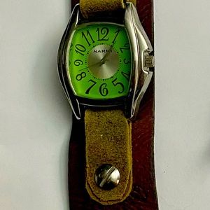 Used fashion watch. Unusual style and color. Women’s wrist size. Works